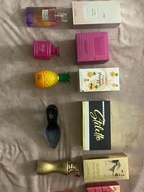 Assorted Women's Fragrance Collection - Pink, Yellow, Purple Bottles